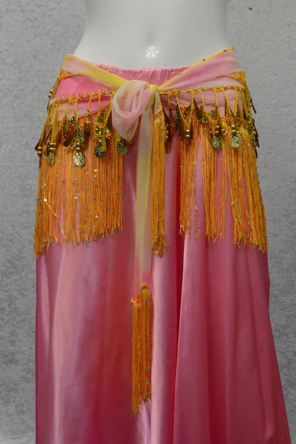 front view of gypsy style hip scarf on pink satin skirt